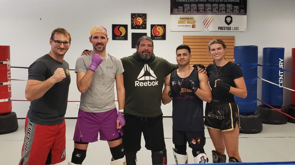 Coach Forrest and a small group of training partners at the gym